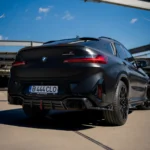 BMW X4M F98 LCI full carbon fibre kit rear profile, showing diffuser, spoiler, and quad exhaust styling