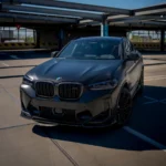 BMW X4M LCI full front end showcasing gloss carbon fibre kidney grille with dry carbon body upgrades