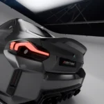 Tail light and carbon spoiler alignment detail close-up