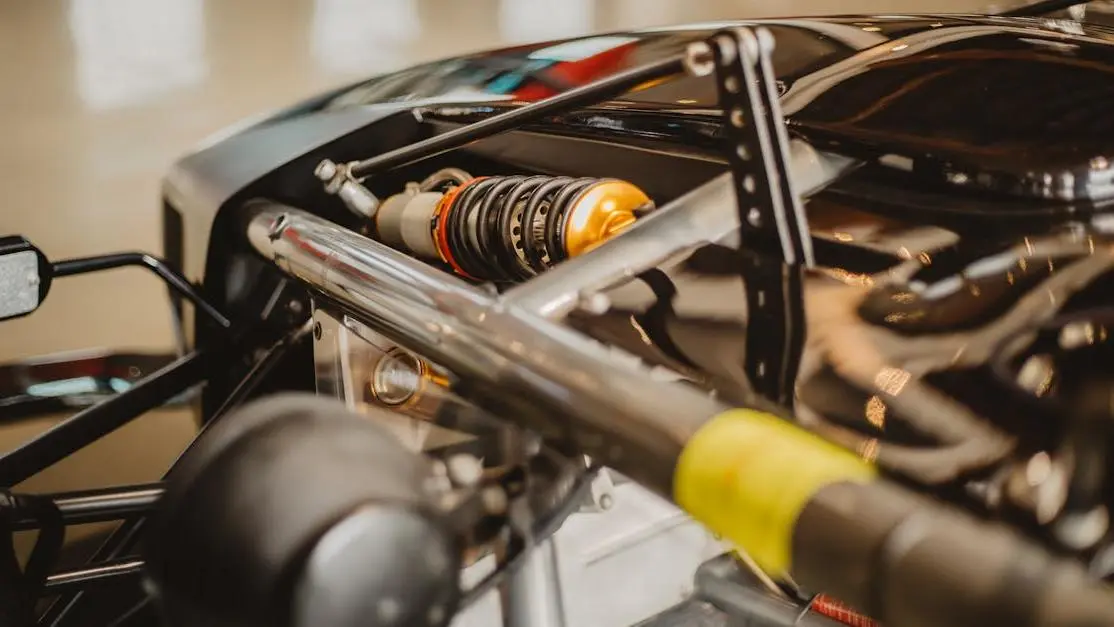 Formula One Car Suspension, Highlighting Adjusting Ride Height For Handling.