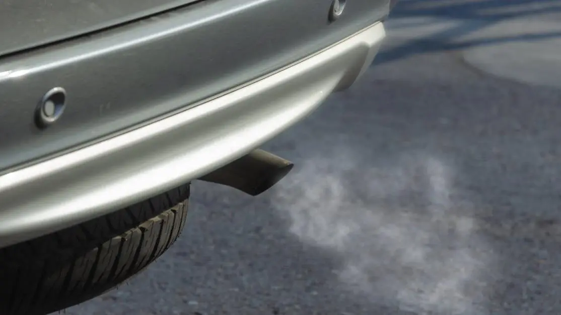 Silver Car Exhaust On Road For How To Install A Cat Back Exhaust System Article.