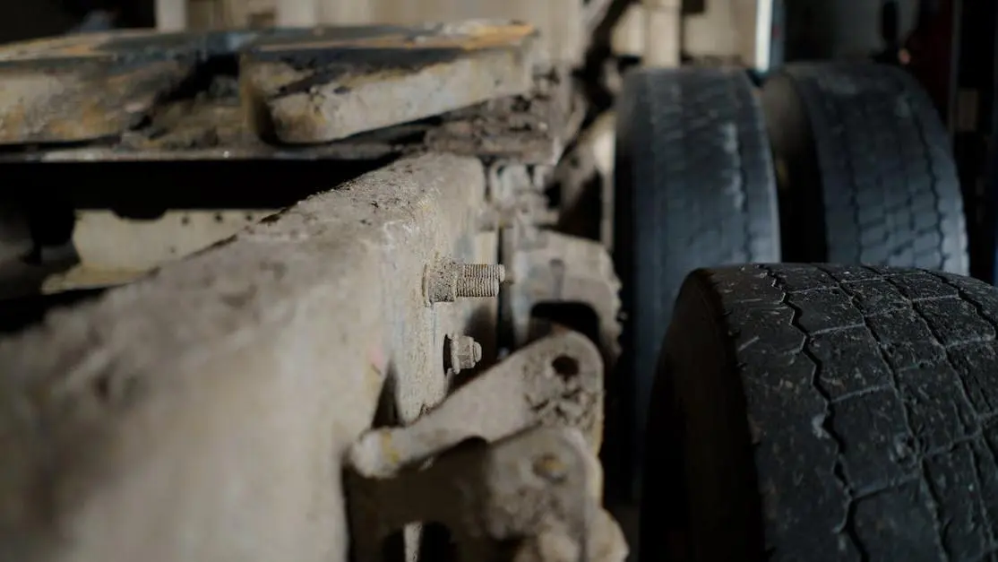 Truck Chassis And Tires During Lift Kit Installation Process.