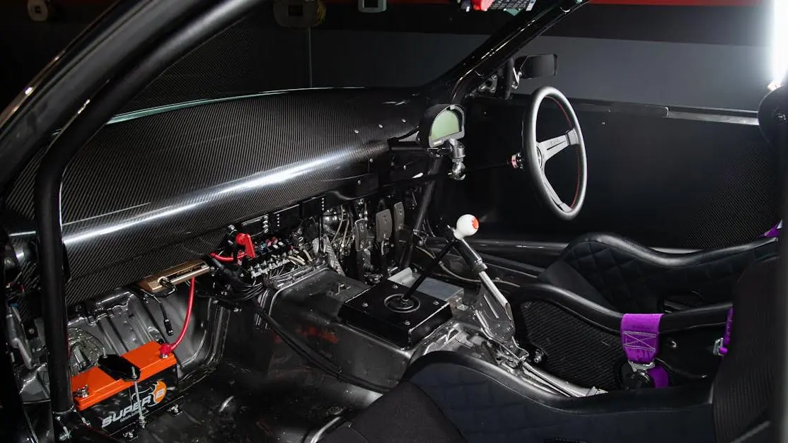 High-Performance Car Interior With Racing Seats, Illustrating &Quot;How To Install A Roll Cage&Quot;.
