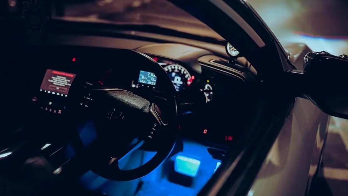 Modern Car Dashboard At Night Highlighting The Benefits Of Ecu Remapping For Performance Enhancement