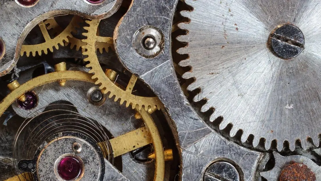 Interlocking gears demonstrating optimal gear ratio selection for quicker acceleration.