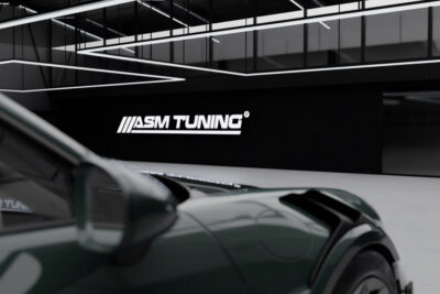 ASM Tuning showroom with luxury cars including BMW M4 and Porsche Carrera – premium carbon fibre aero kits and forged carbon upgrades 2025
