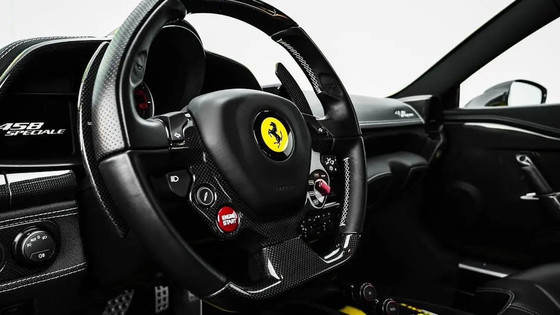 Ferrari steering wheel on 458 Speciale with carbon fiber, paddle shifters, and LED shift lights