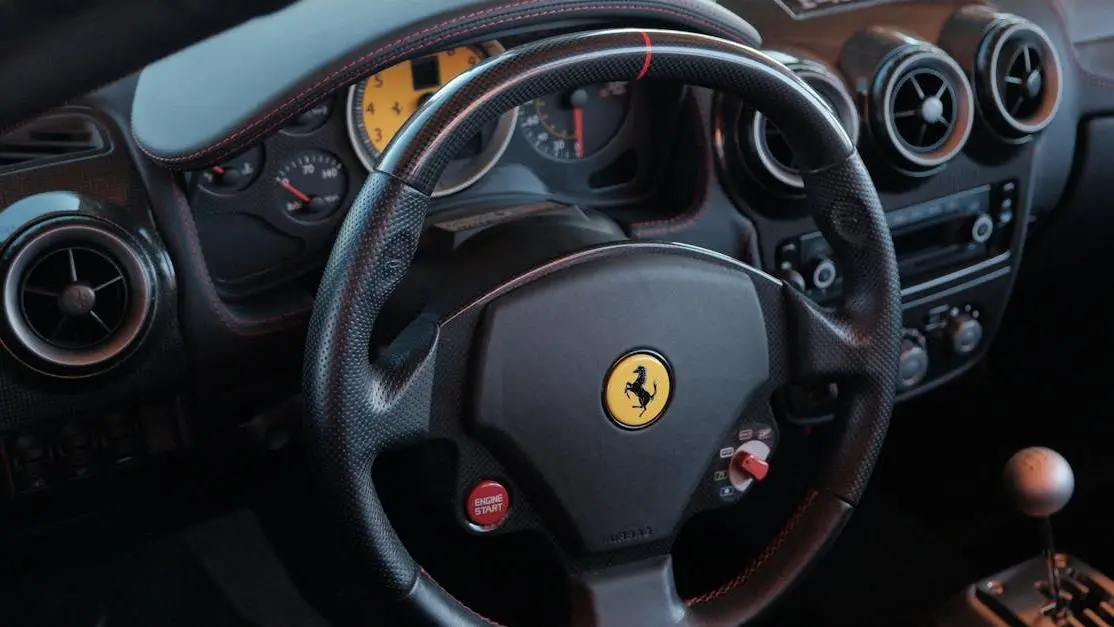 Steering wheel Ferrari close-up with dashboard in a sports car interior cover photo