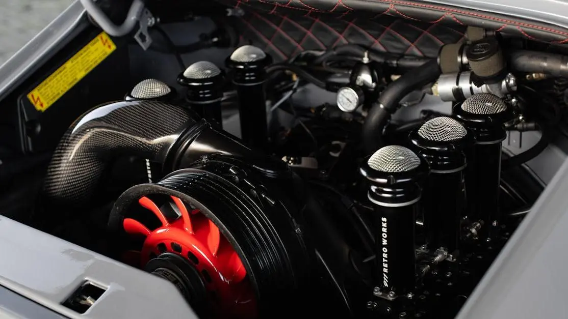 High-performance engine with carbon fiber and chrome components at Summit Auto Parts